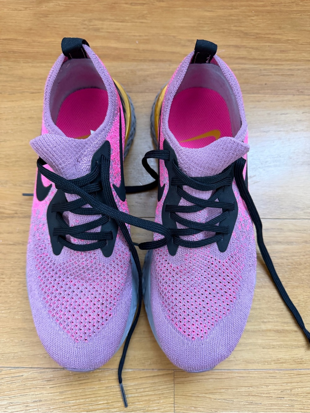 Nike Women's Pink and Black Flyknit Athletic Sneakers